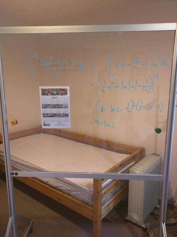 Perspex "whiteboard" framed and on wheels great for teaching aid